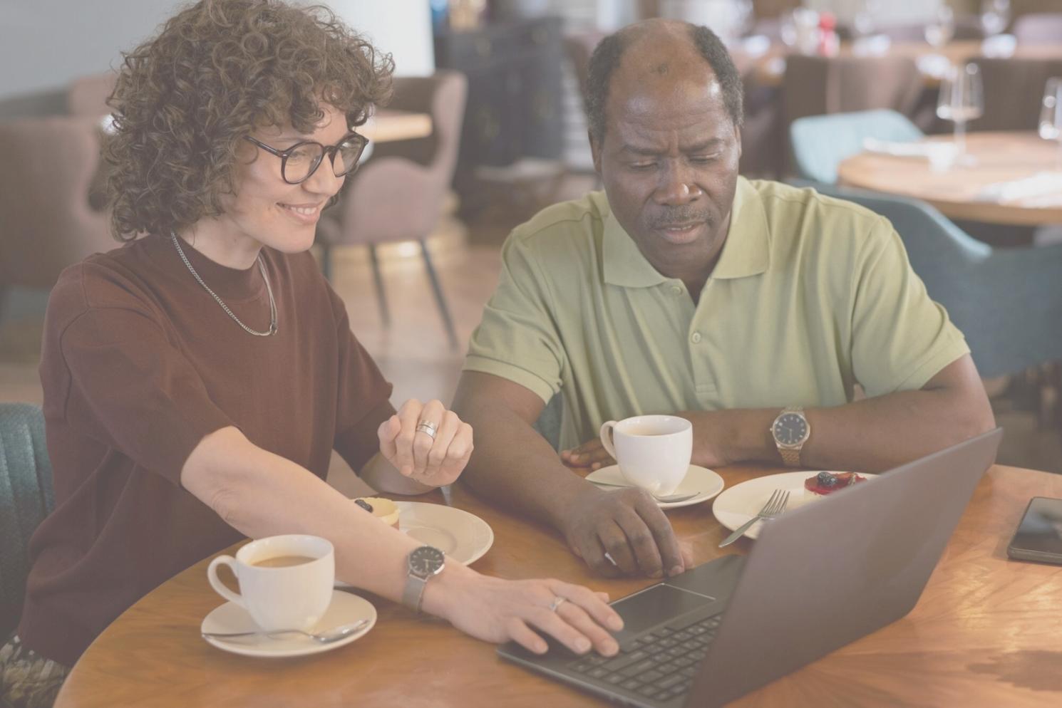 Business owner reviewing restructured debt agreements and payment schedules